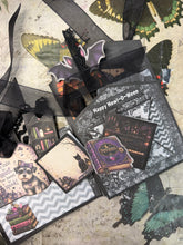 Load image into Gallery viewer, Howl-O-Ween Manor Halloween junk journal interior with pockets, tags and ephemera
