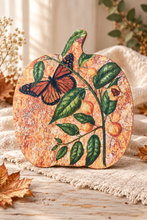 Load image into Gallery viewer, Finished mixed media wooden pumpkin with butterfly and leafy design, displayed on a linen-covered table
